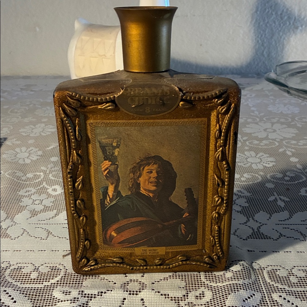 Framed Vintage-Style Decorative Bottle in Metallic Bronze